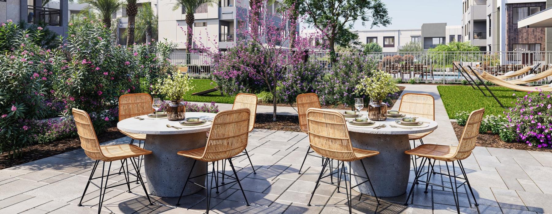 a patio with tables and chairs